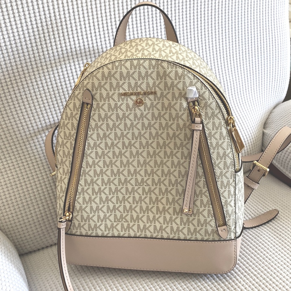 Michael kors backpack light pink and cream